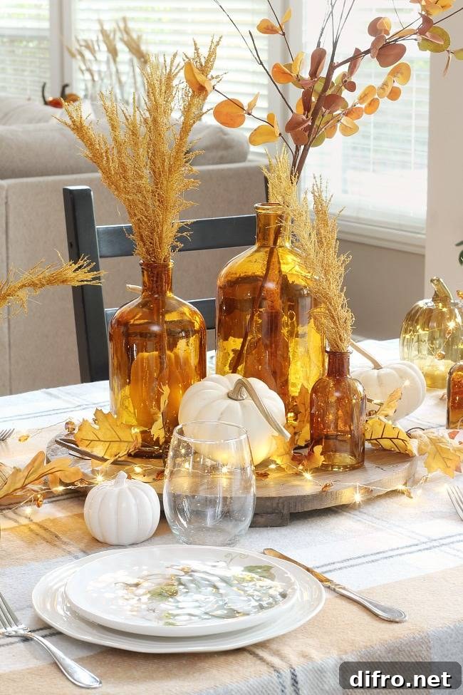 Table display with amber colored glass and fall lights