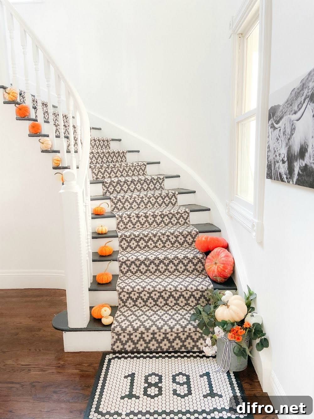 Pumpkins arranged on stairs for fall decor