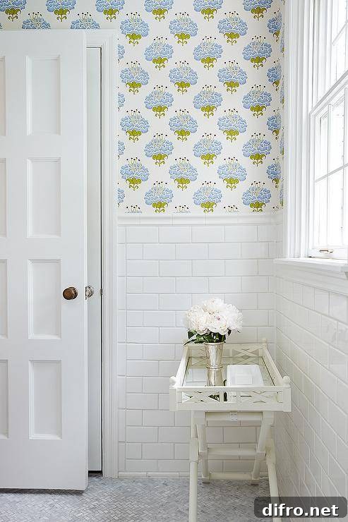 A white bamboo tray table beside a freestanding tub.