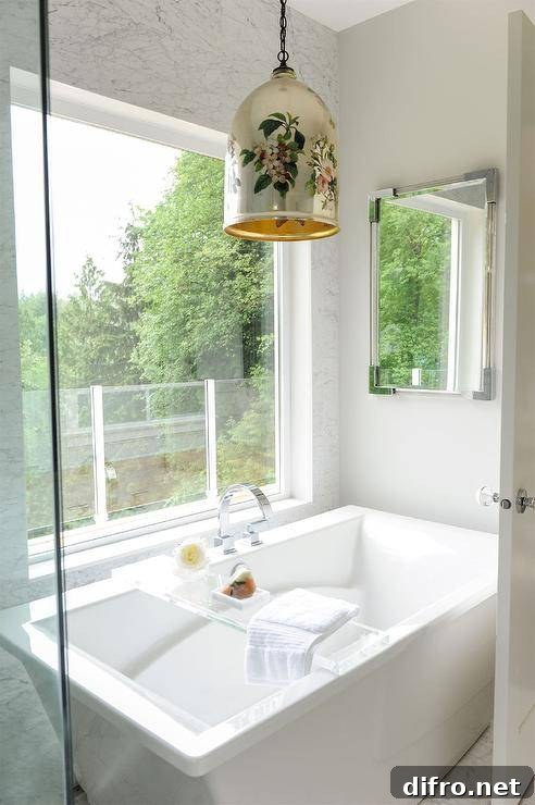 A lucite bath tray on a freestanding bathtub.