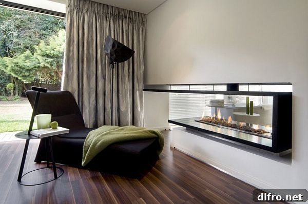 Bedroom with large windows looking out to the courtyard