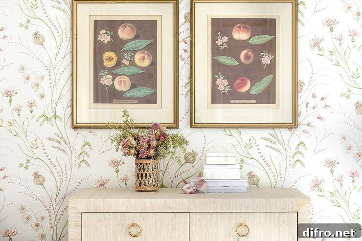 Vintage botanical prints in gold frames hang over a raffia wrapped dresser.
