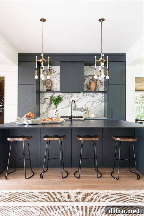 Modern kitchen design features a black oak island with black waterfall edge and wooden and metal tractor stools