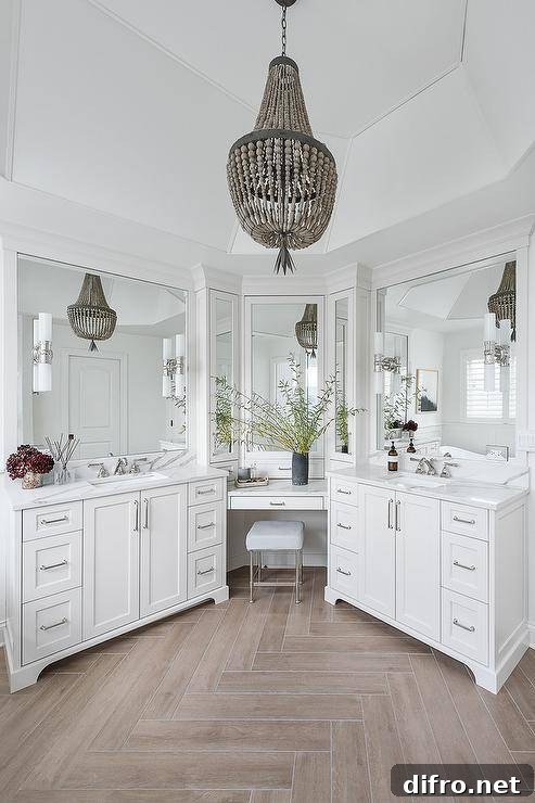 Drop-down makeup vanity in a vaulted bathroom with chandelier