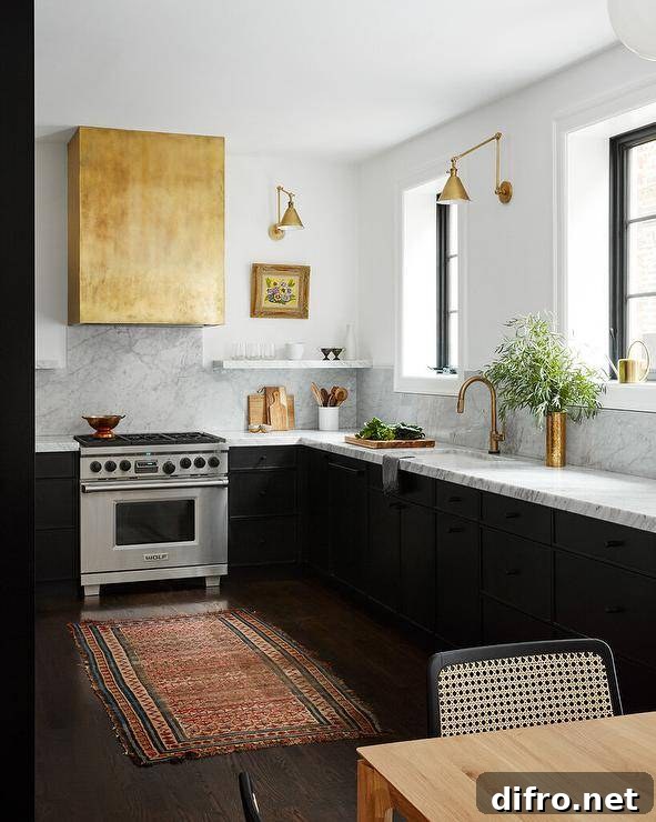 Brass dome range hood over a marble slab backsplash