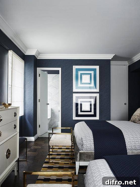 Shared bedroom with navy blue wall and elegant accents