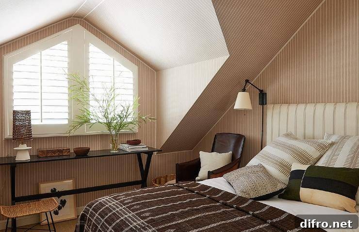 Bedroom with warm brown accents and striped textiles