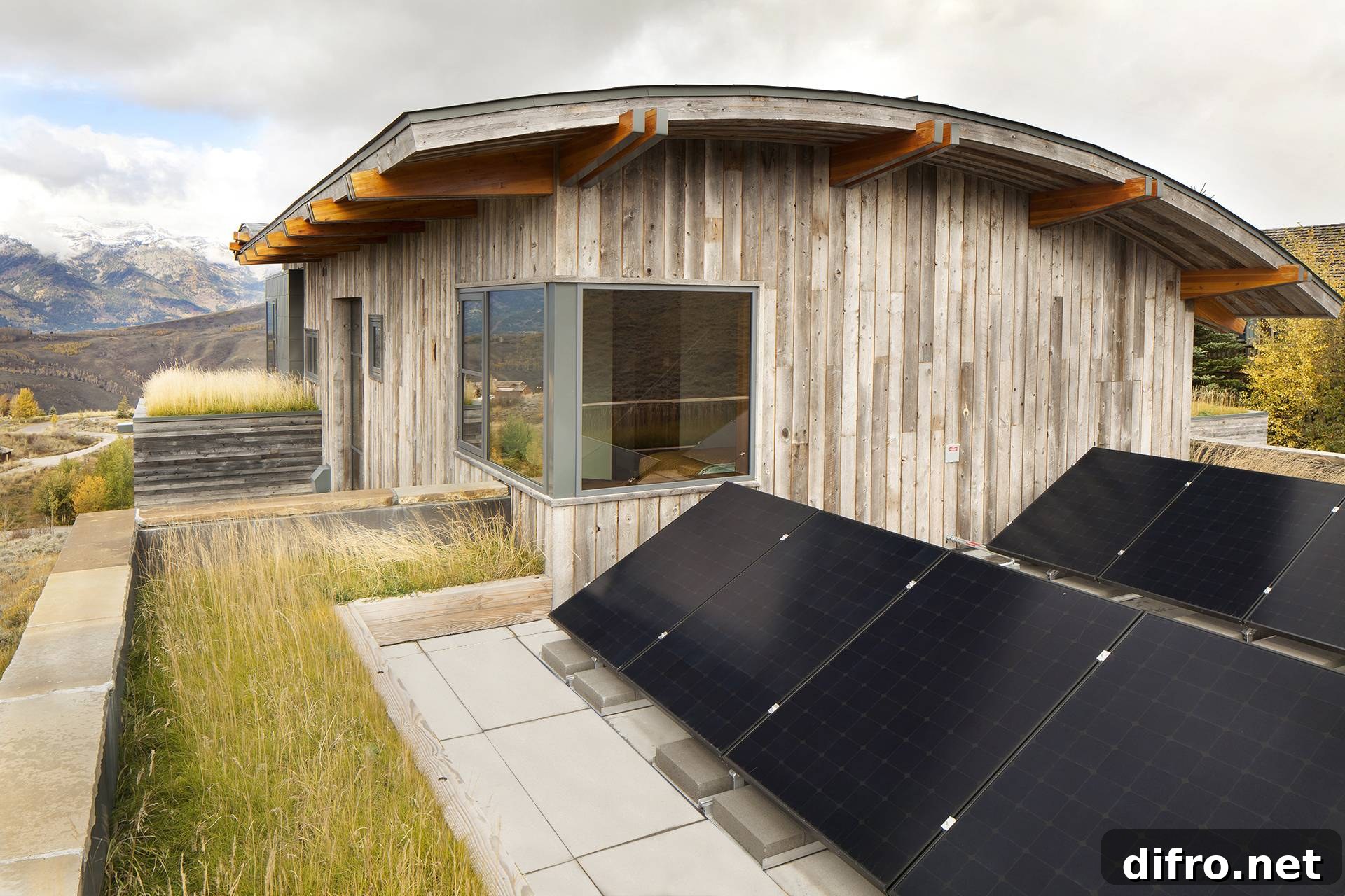 black solar panels on roof of wood panelled home exterior