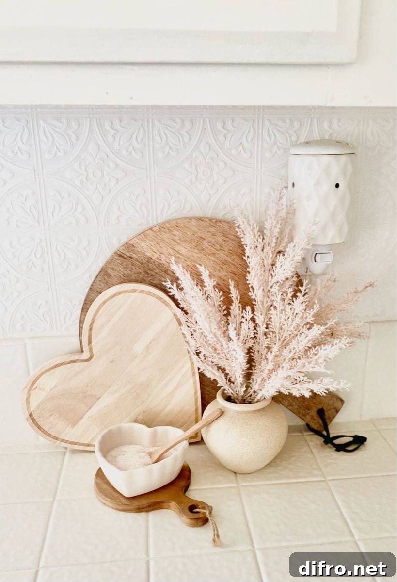 Neutral Valentine's vignette with heart-shaped board