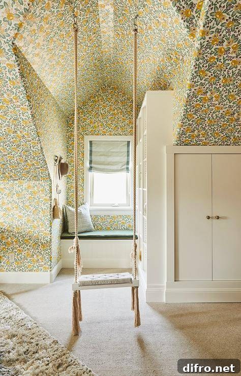 Attic bedroom with orange and green floral wallpaper and a rope swing
