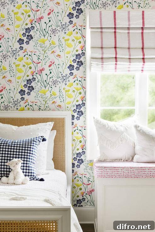 Bedroom with floral wallpaper, cane headboard, and gingham pillow