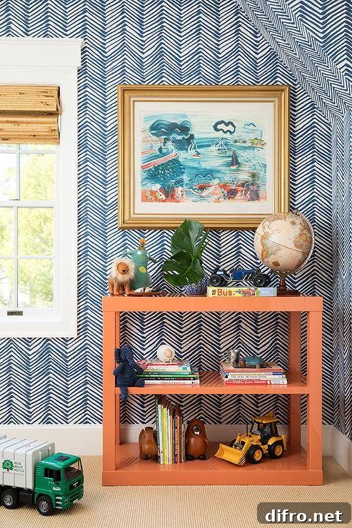 Boys' bedroom with chevron wallpaper and orange shelving
