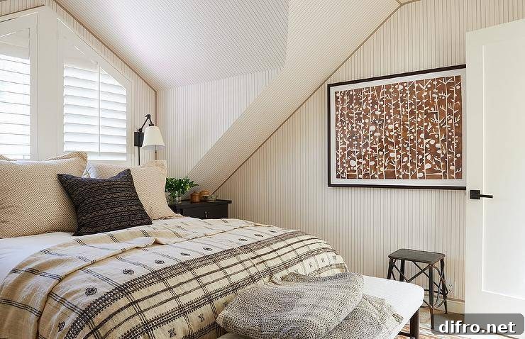 Bedroom with neutral brown striped wallpaper