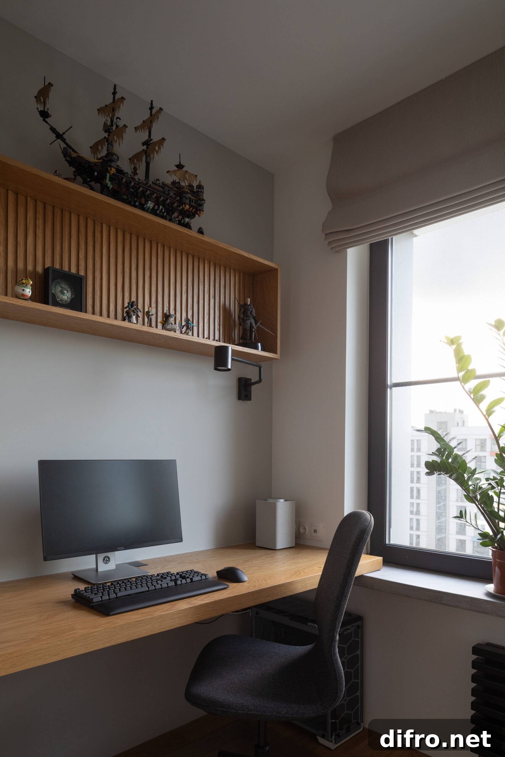 minimal study room with wood slab desk and dark accessories