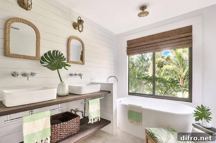 Spa-like white master bath with warm wood accents and tropical greenery