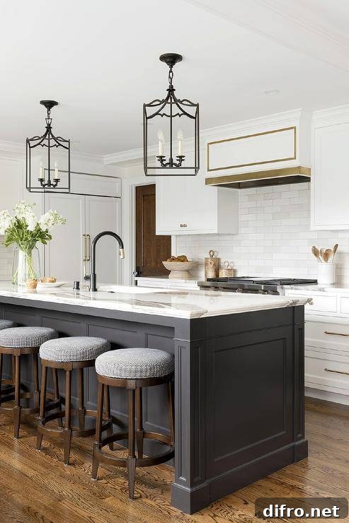 Backless stools sit at a black center island topped with a statuary marble countertop holding a sink with a matte black gooseneck faucet lit by two black gothic lanterns.