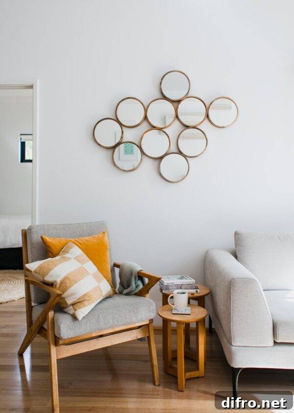 stylish living room with mirror artwork on the wall