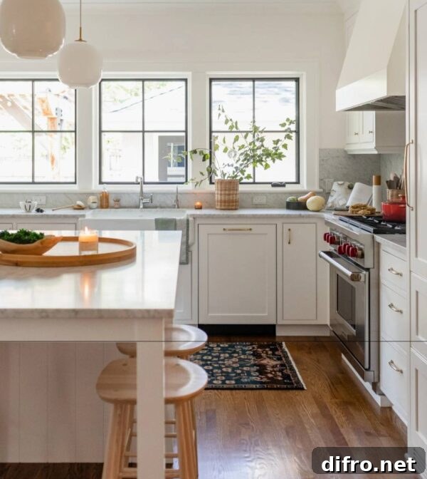 A neutral kitchen with a stainless steel oven