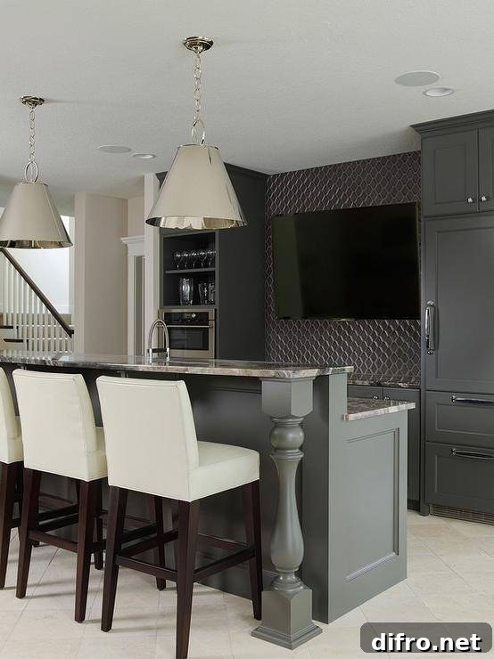 Sleek basement bar with black cabinets and gray granite countertops, a flat panel TV and cream leather bar stools.