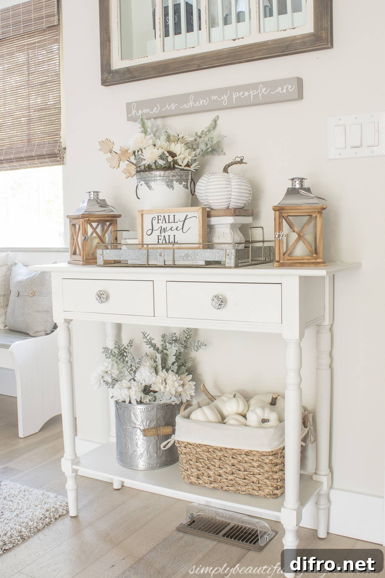 Crisp white fall entry way with two small signs.