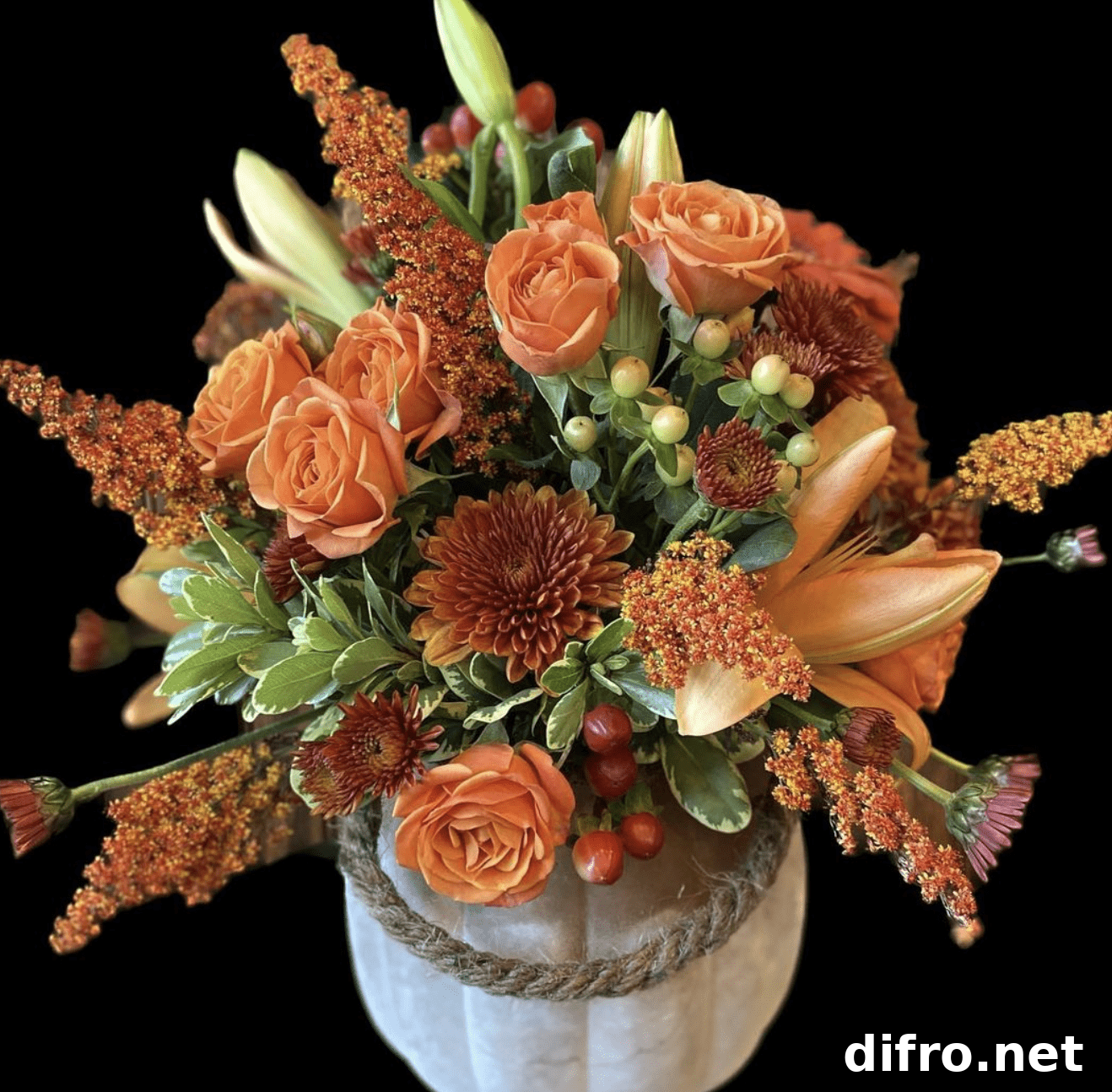 Fall orange and yellow flower arrangement.