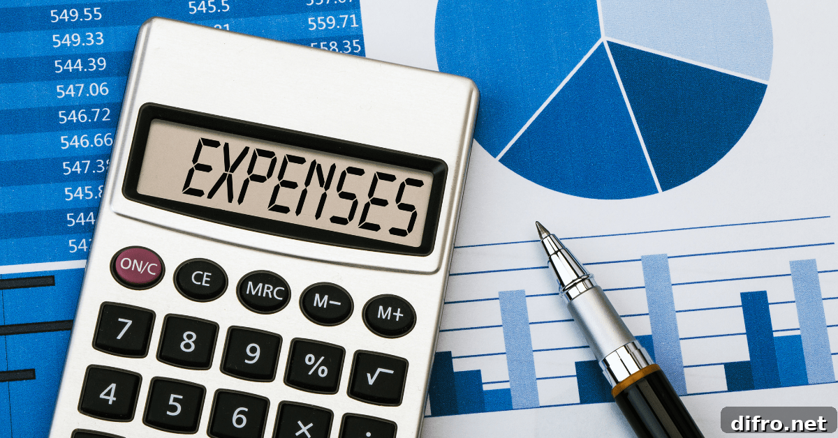 Calculator and pen on paper, the calculator reads EXPENSES