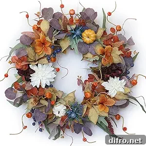 fall wreath with white dahlia pumpkin and purple eucalyptus