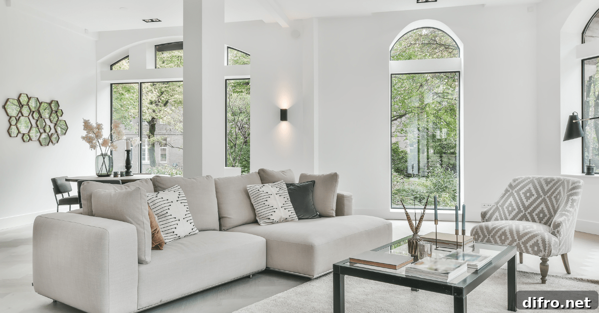 Modern living room with grey and white colors.