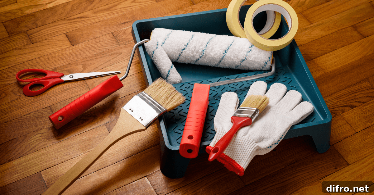 Assortment of painting tools on the floor.