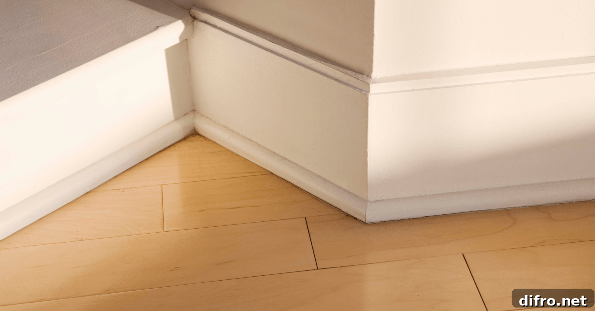 A closeup of white baseboards.
