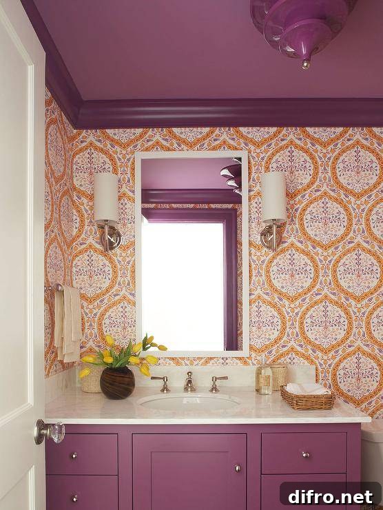 Ceiling Design Ideas to Add Personality to Your Home 4 Stylish purple and orange powder room boasts walls covered in purple and orange wallpaper lined with purple crown moldings complementing a purple painted ceiling. A white vanity mirror is mounted between sconces and over a purple wooden washstand finished with a white marble countertop.