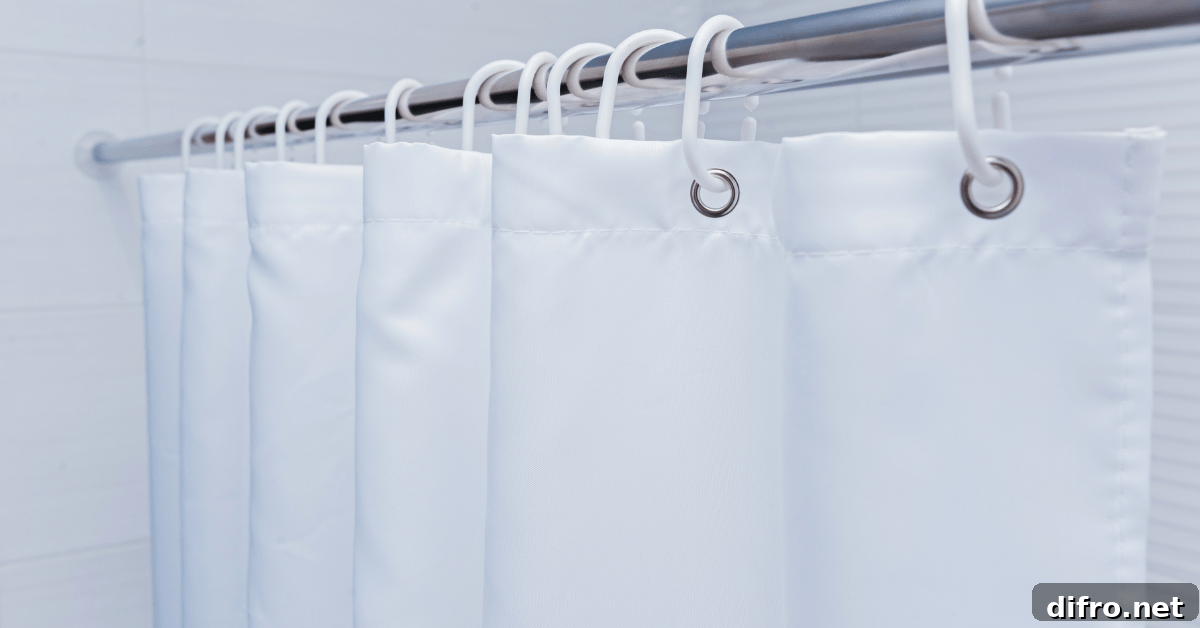White standard shower curtain size with plastic hooks.