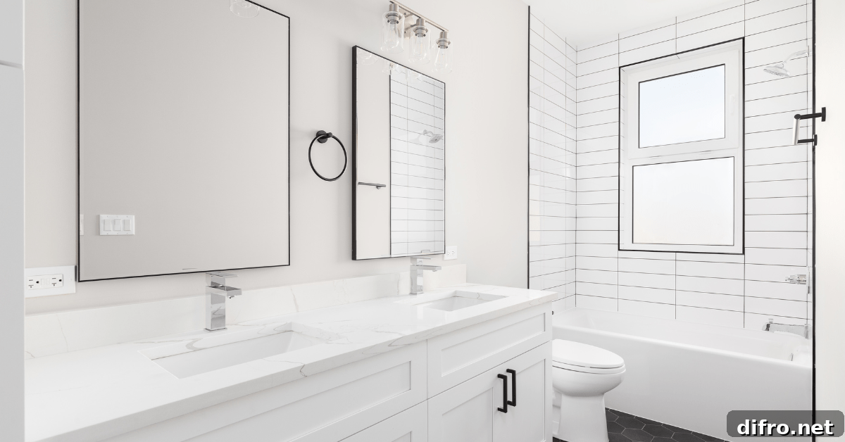 White bathroom with subway tile shower.