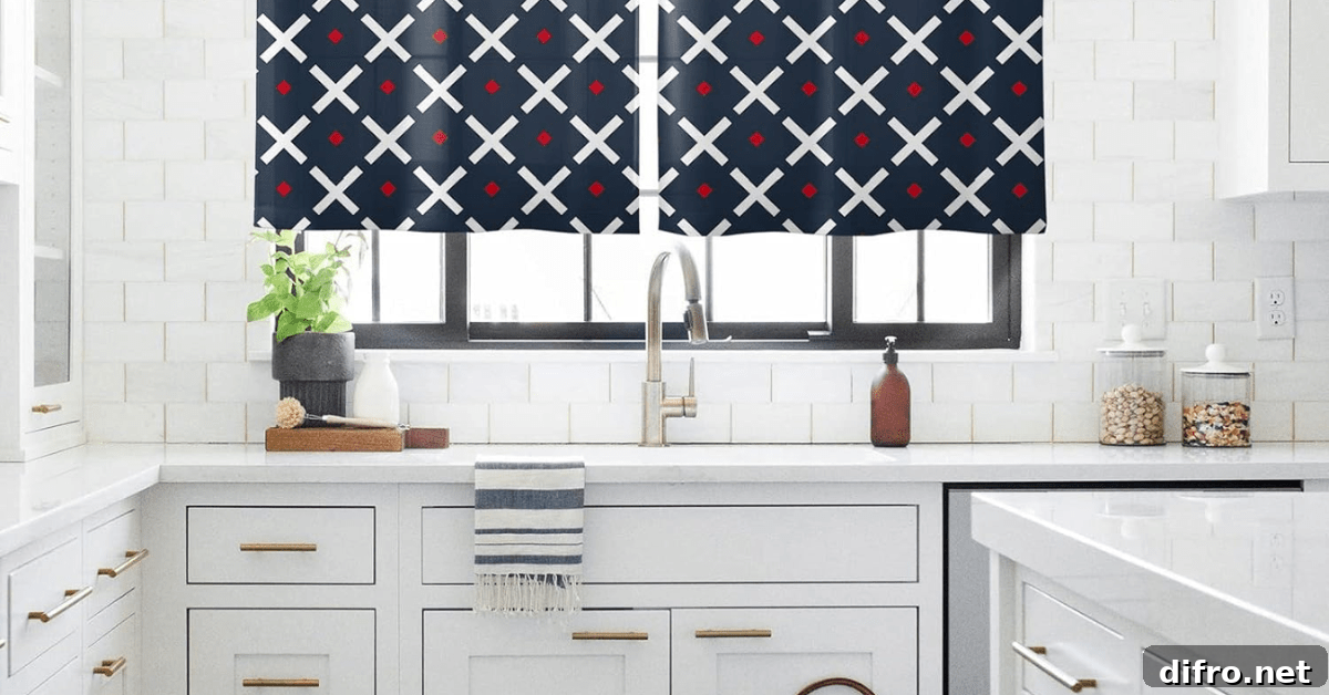 A white kitchen with patterned curtains.