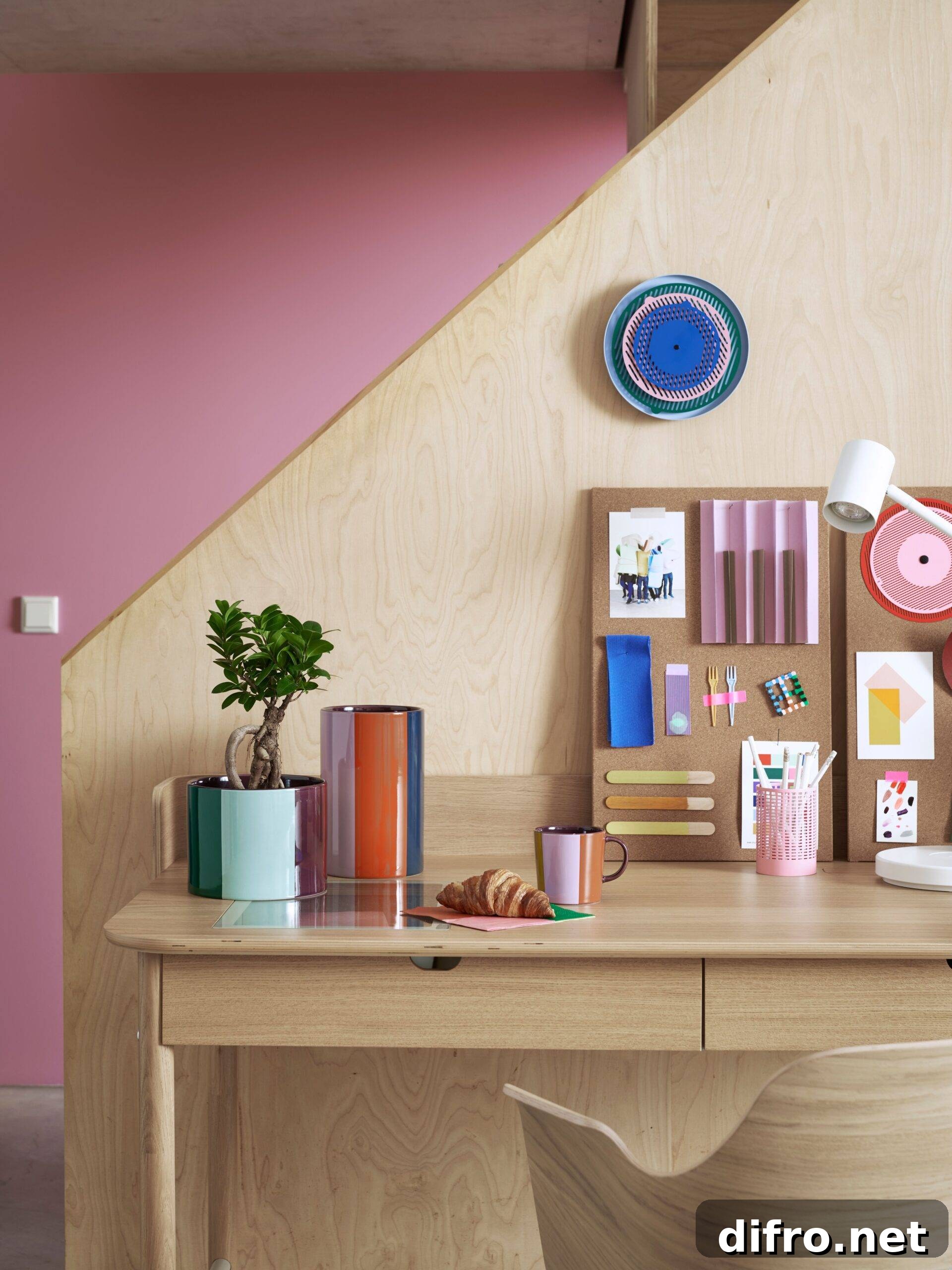 Small colored home decor elements arranged on a crafting table