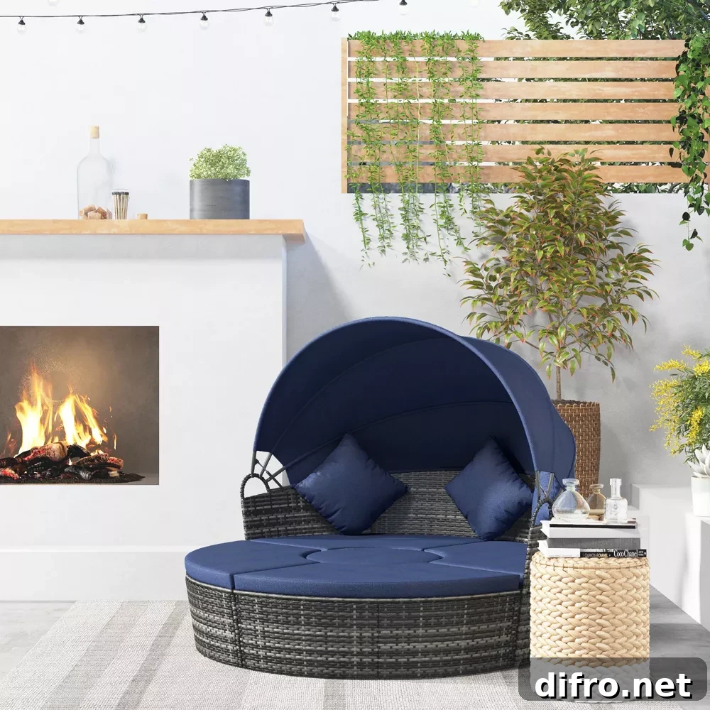 day bed with shade on white patio with fireplace
