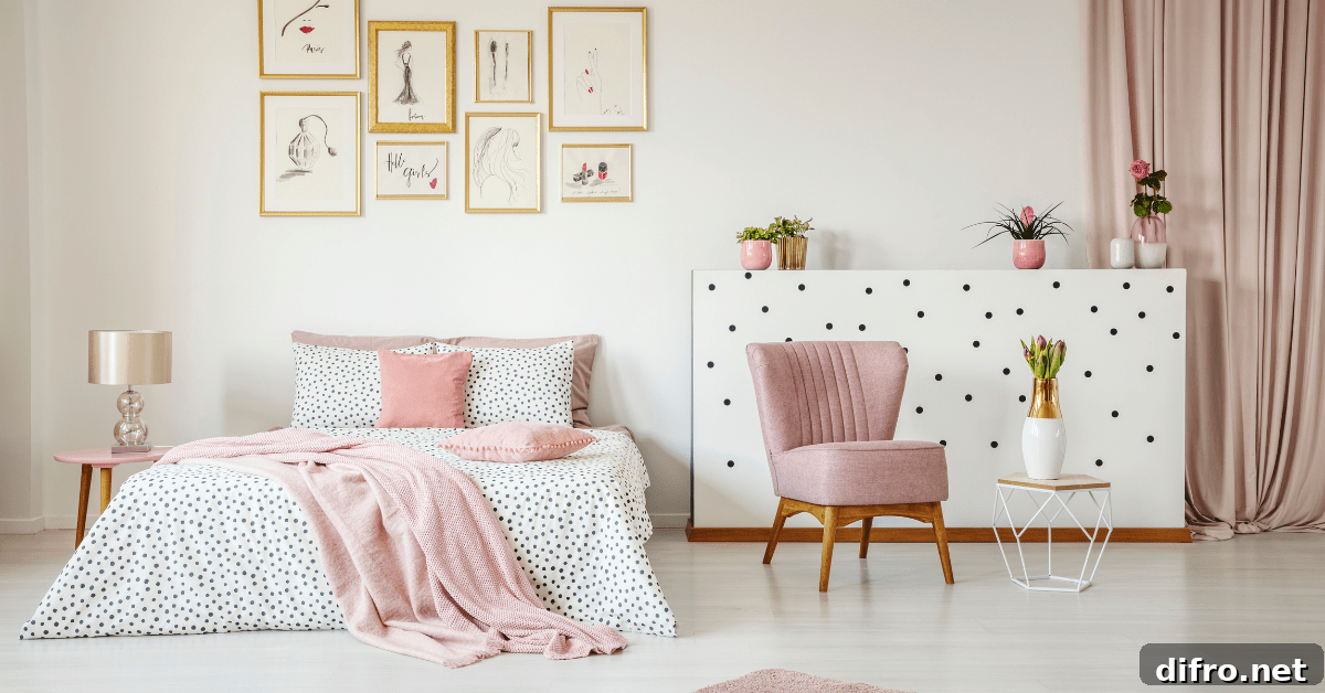 A white and pink bedroom with pink chair.