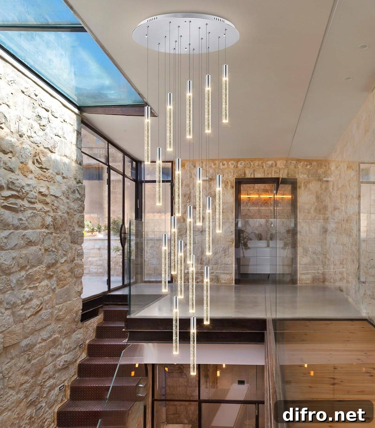 A staircase with glass lighting fixture.