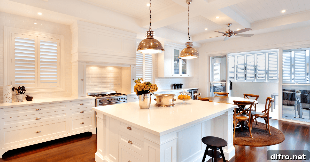 A luxurious kitchen with copper overhead lights above the kitchen island.