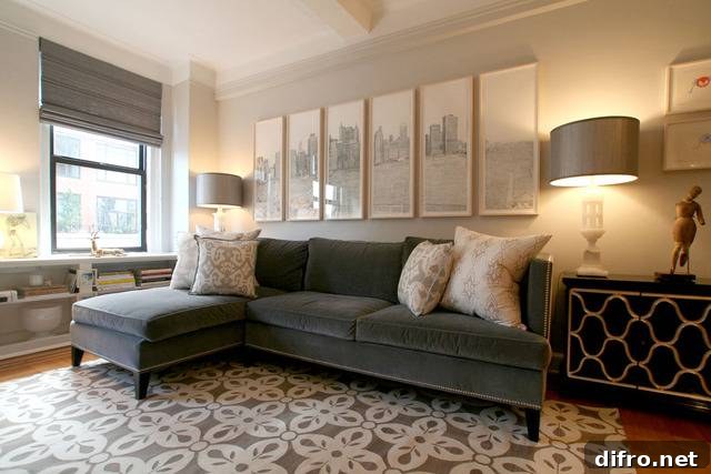 Chic living room with gray velvet sofa and decorative lamp.