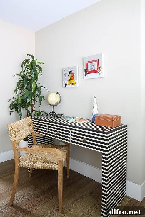 Striped desk with woven chair and house plant in a child's workspace