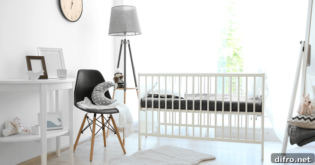 A modern small nursery with black chair.
