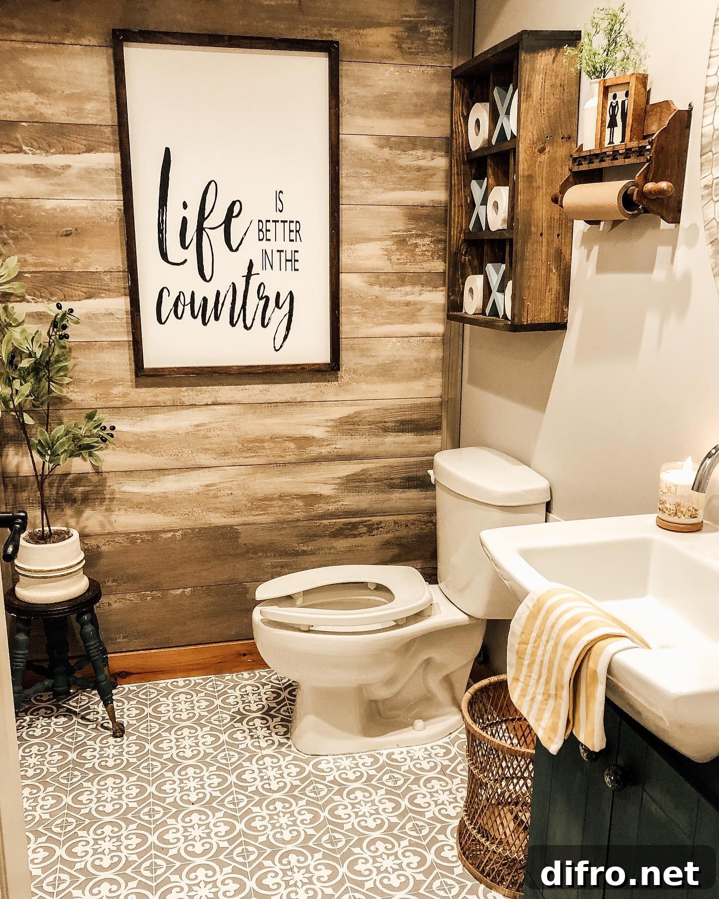 rustic bathroom with large farmhouse wall art stenciled floor