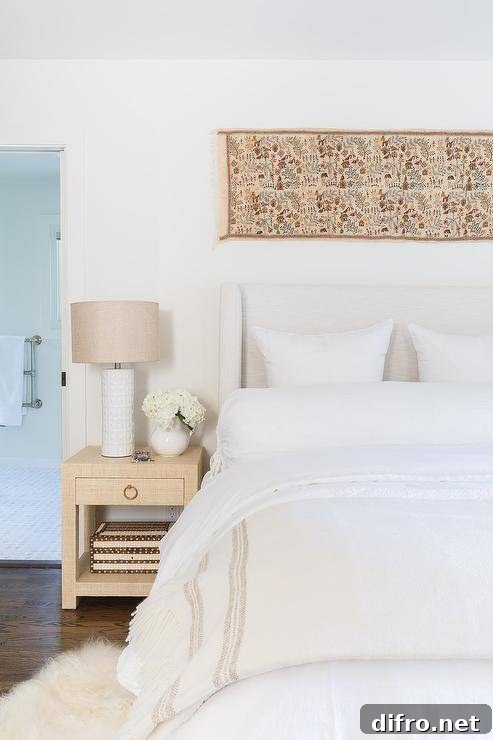 10 Creative Tapestry Hanging Ideas to Transform Any Room 3 Bedroom with wingback headboard, linen bedding and a long tapestry over the headboard.