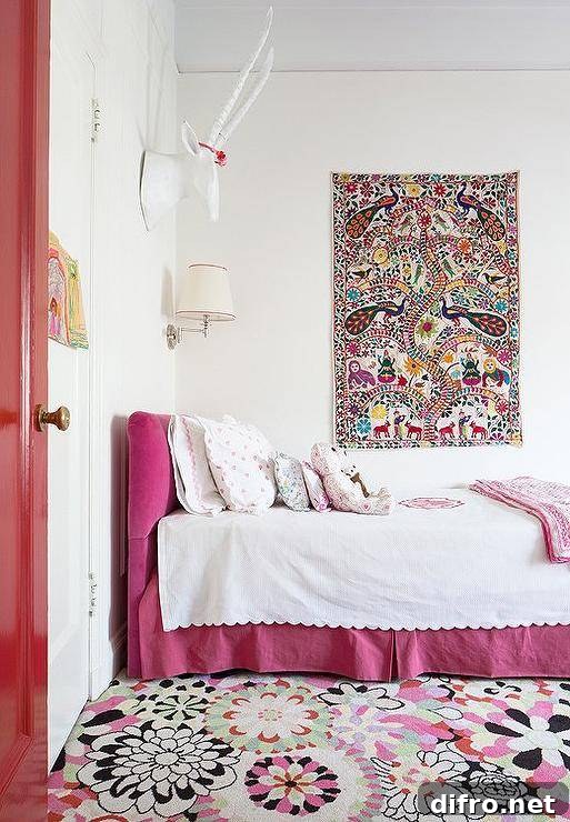 10 Creative Tapestry Hanging Ideas to Transform Any Room 9 Pink girl's bedroom with a colorful tapestry hung above the bed.