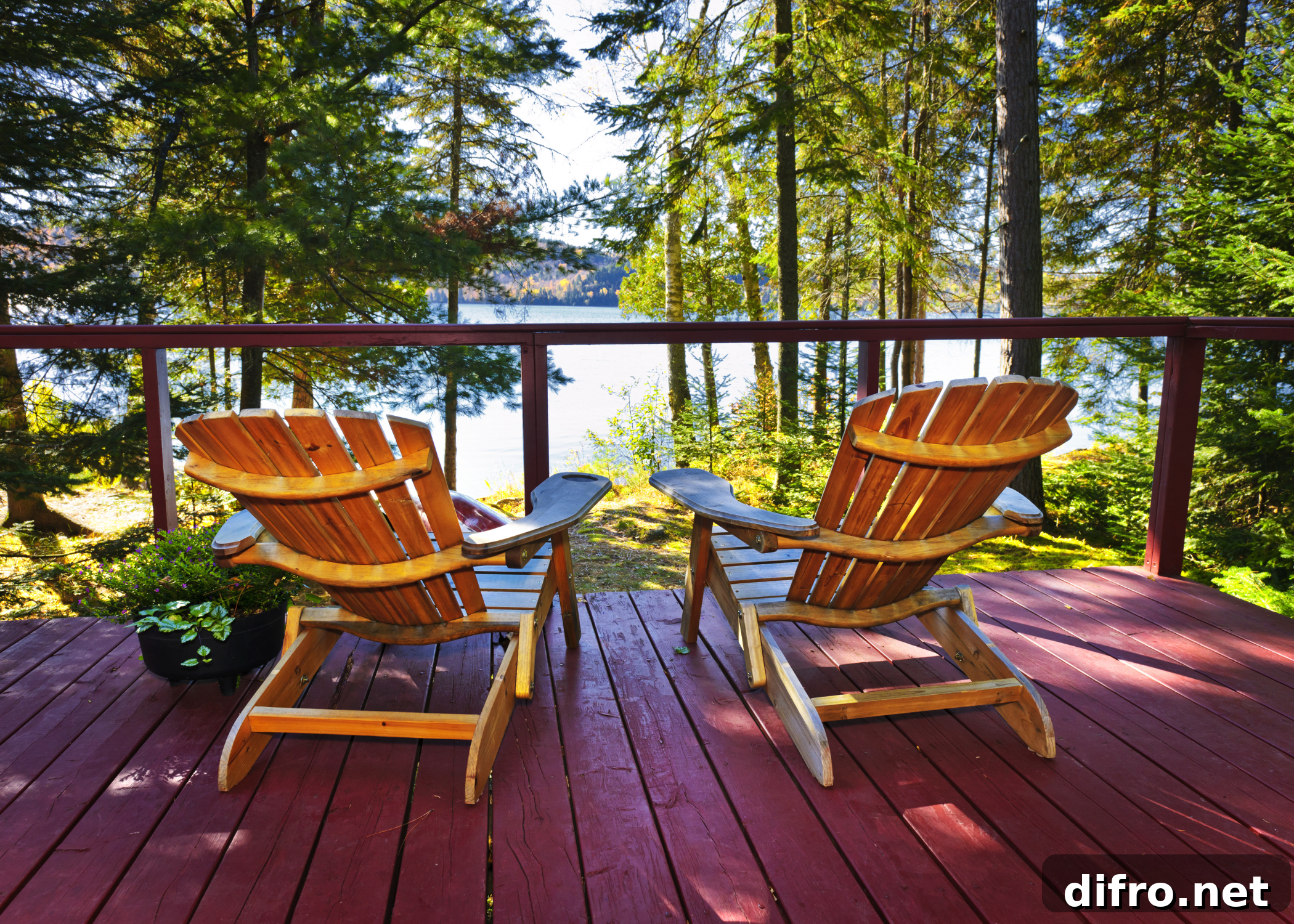 large deck with two muskoka chairs