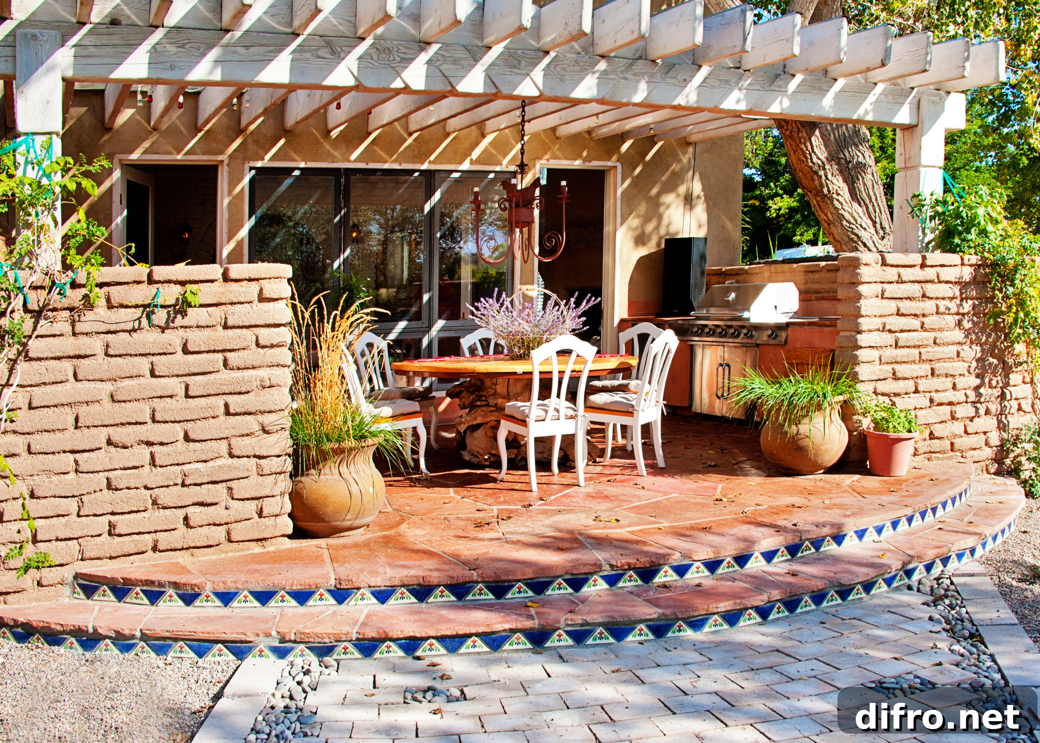 large deck with white pergola and white chairs