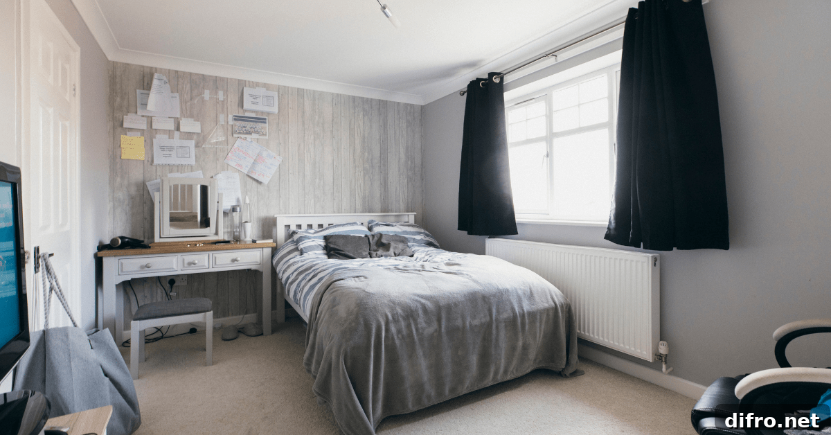 A small boys bedroom with cozy bed.