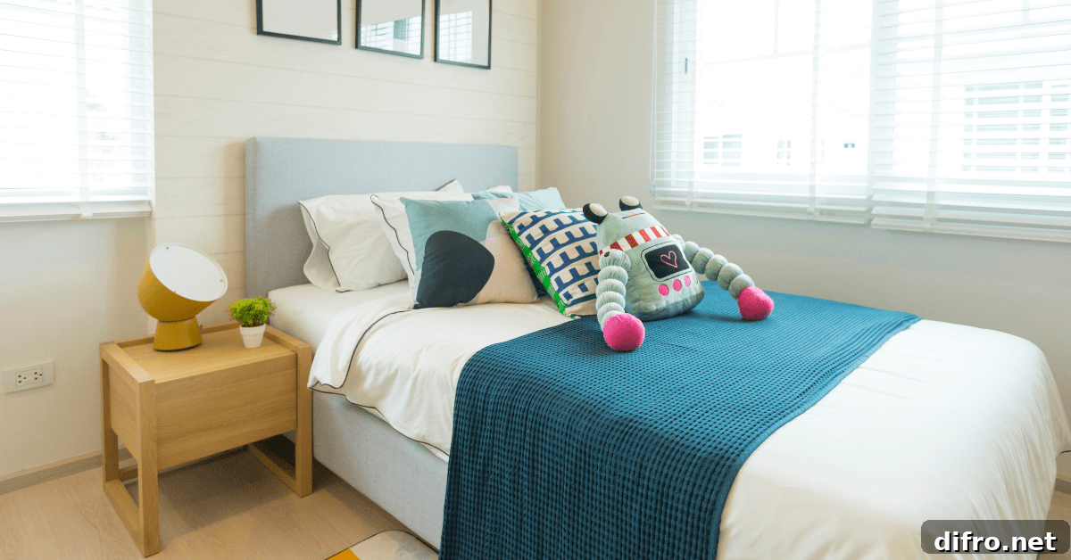 A sleek boys bedroom that's small.