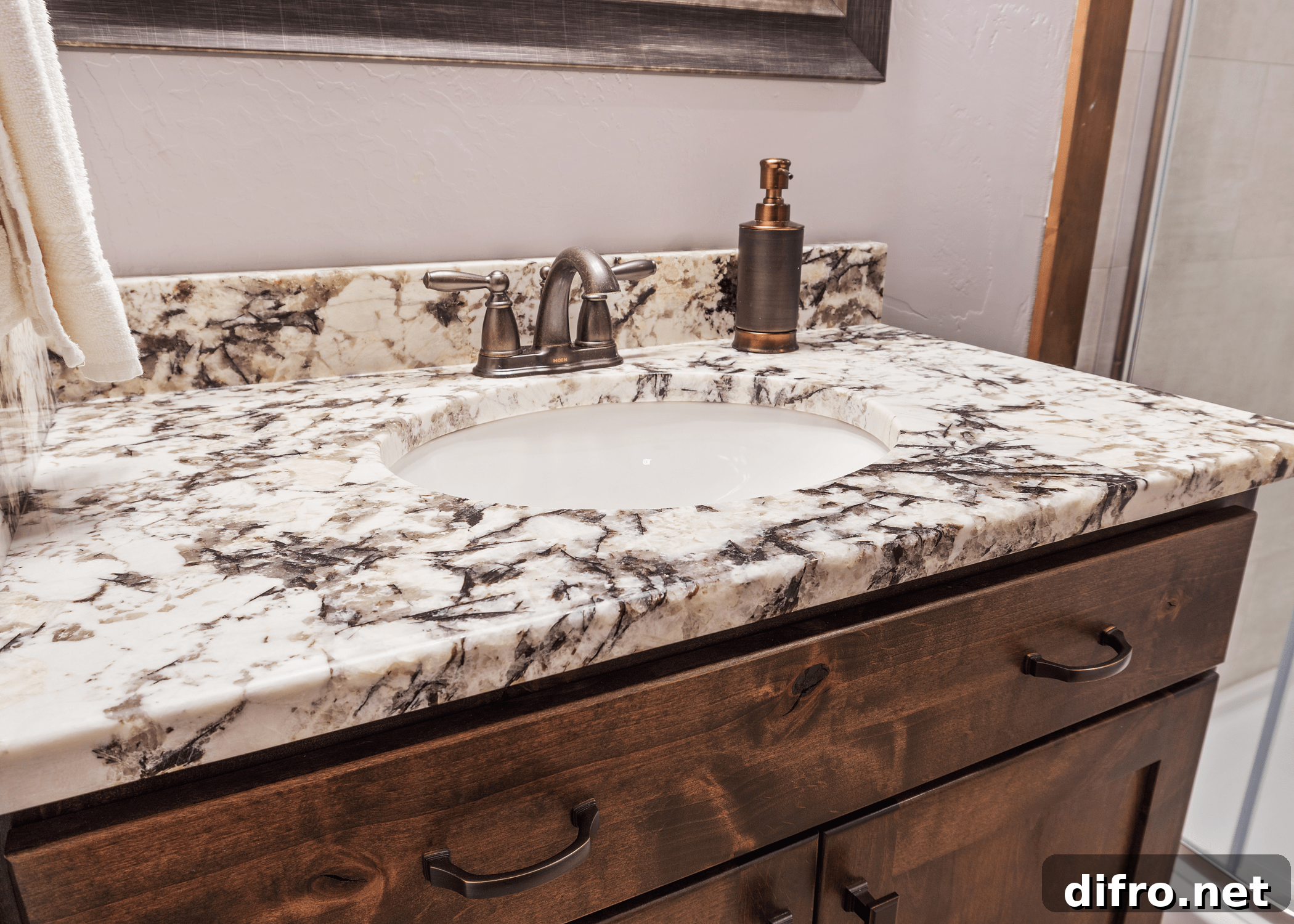 How to Choose Bathroom Countertops: Expert Tips and Materials 5 marble bathroom countertop with bronze faucet